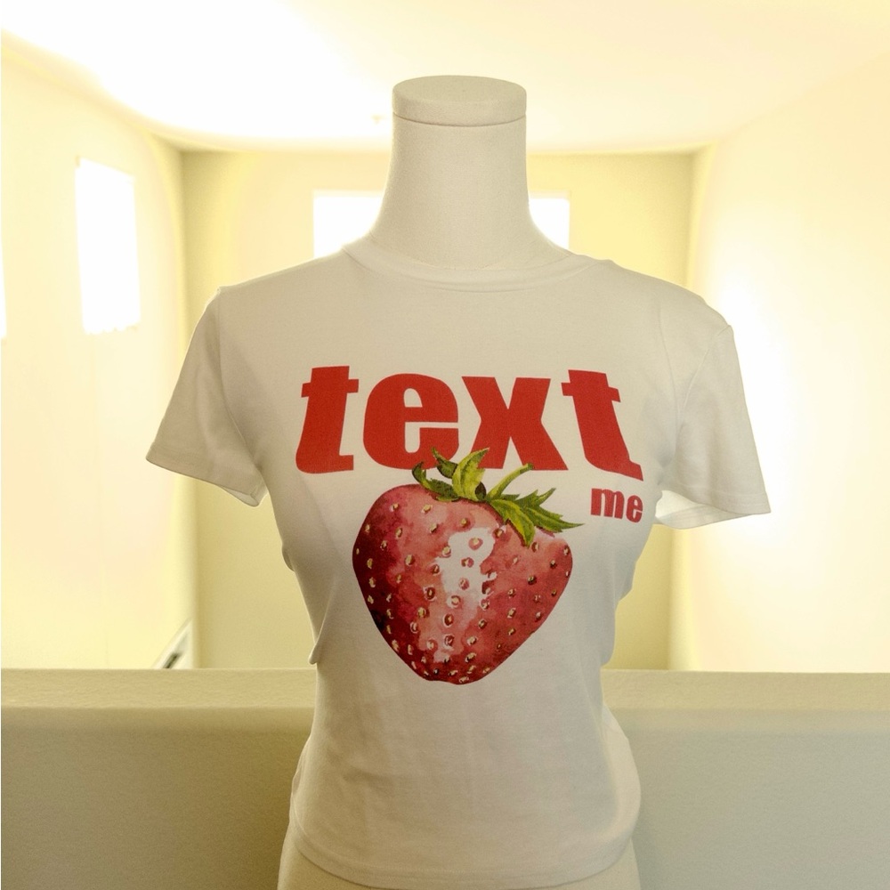 Edikted White Crop Top with Red Text and Strawberry Graphic
